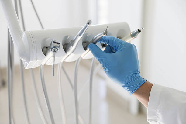 Professional Root Canal Treatment technician working in Stanton, MI